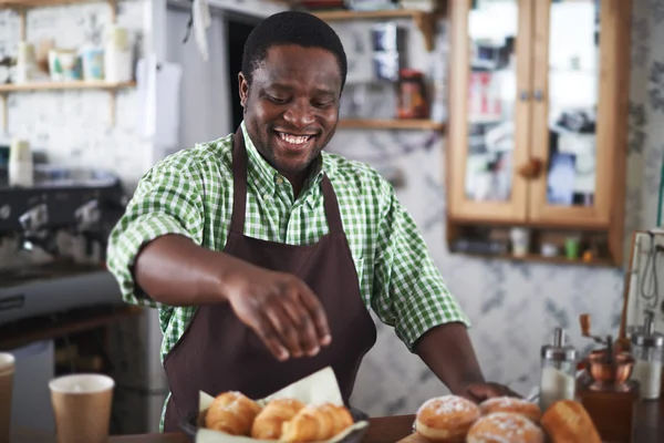 Pães em pó padeiro com açúcar de baunilha — Fotografia de Stock