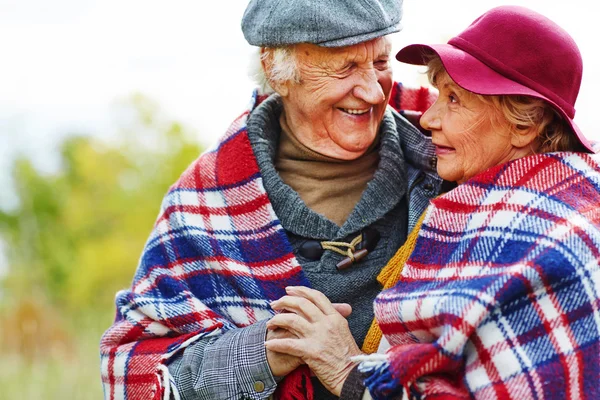 Retired seniors in warm clothes — Stock Photo, Image
