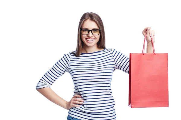 Vrouw met rode boodschappentas — Stockfoto