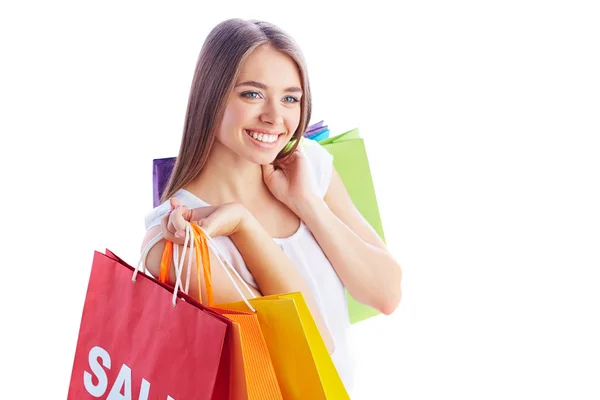 Mujer sosteniendo colorido compras — Foto de Stock