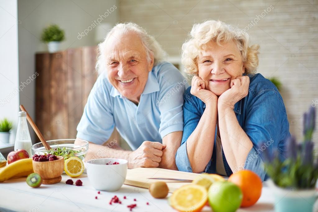 senior man and woman  in the kitchen