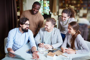 Bearded businessman with touchpad