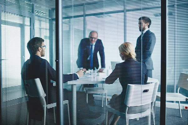 Modern managers discussing ideas — Stock Photo, Image