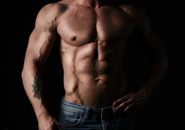 Torso of young muscular man — Stock Photo, Image