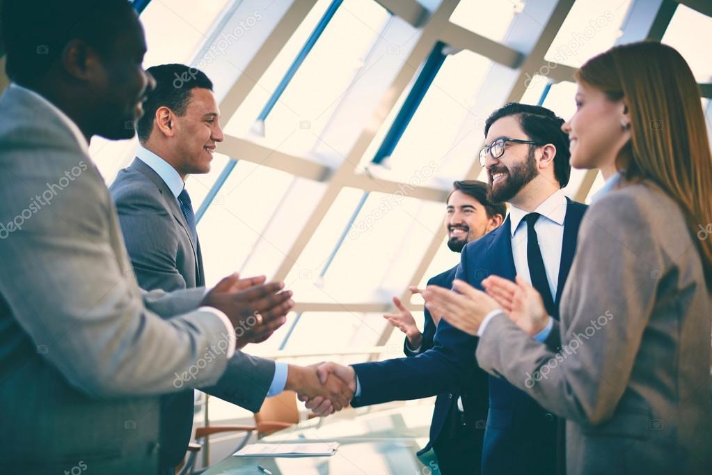 Business partners greeting each other