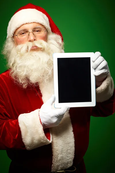 Santa Claus with touchpad — Stock Photo, Image