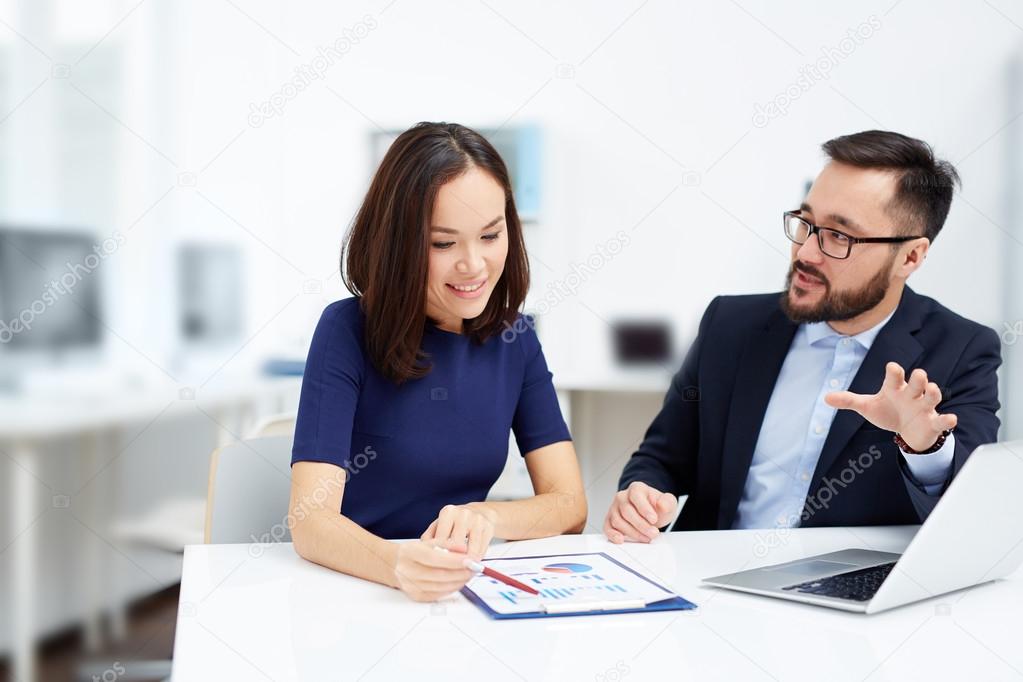 employees Discussing data