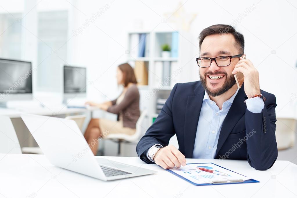 businessman Calling at workplace