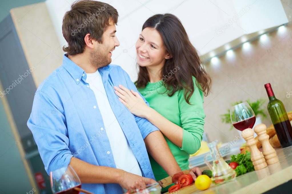 husband cutting vegs  for salad