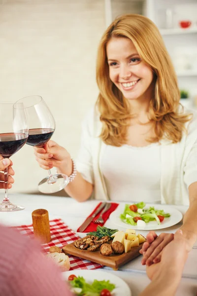 Woman toasting with her husband — Stock Photo, Image