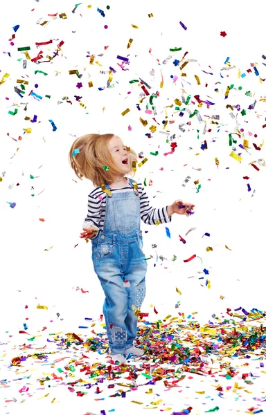 Menina brincando com confete — Fotografia de Stock