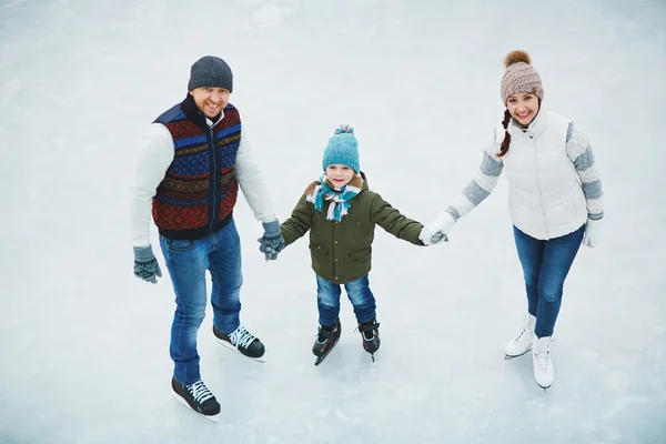 Active family skating — Stock Photo, Image
