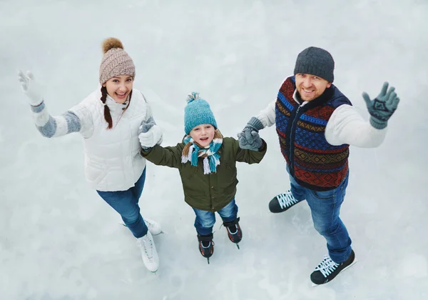 Active family skating — Stock Photo, Image