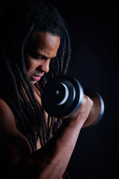 Man exercising with barbell — Stock Photo, Image