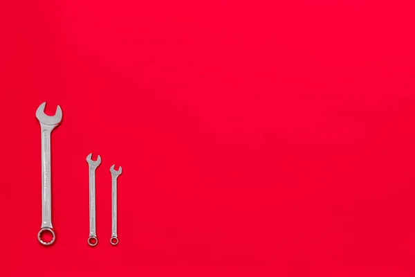 Three Metal Wrenches Different Sizes Isolated Red Background Copy Space — Stock Photo, Image