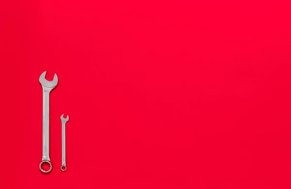 Two Metal Wrenches Different Sizes Isolated Red Background Copy Space — Stock Photo, Image