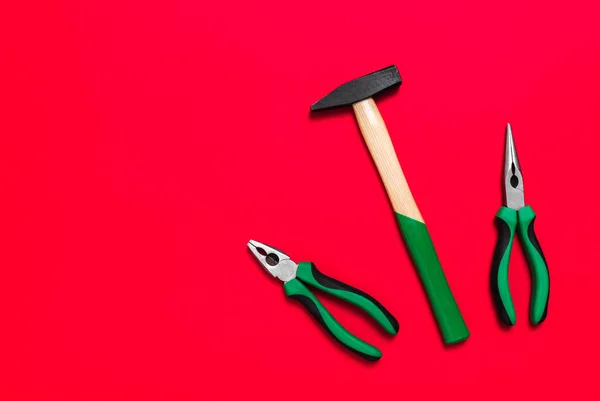 Quality Green Building Pliers Hammer Tools Repair Car House Red — Stock Photo, Image