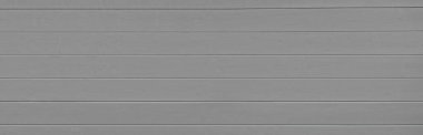 Gri ahşap kaplama arka plan. Boşluğu kopyala, metin yeri. Ahşap malzeme dükkanı. Doğal afiş. Boyalı tahta kereste. Duvar kaplaması. Rustik model. İç mekan. Yatay çizgiler. Pantone rengi.