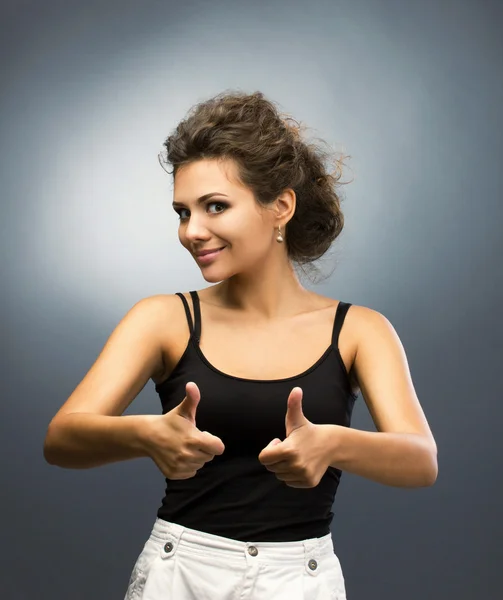 Mujer mostrando pulgar hacia arriba —  Fotos de Stock