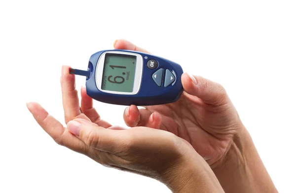 Hands with glucometer — Stock Photo, Image