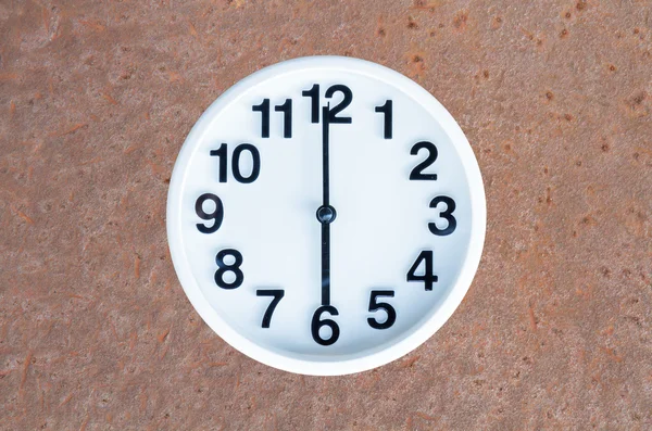 Clock on steel rusty background — Stock Photo, Image