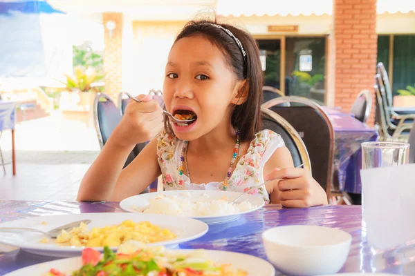 Girl eating food