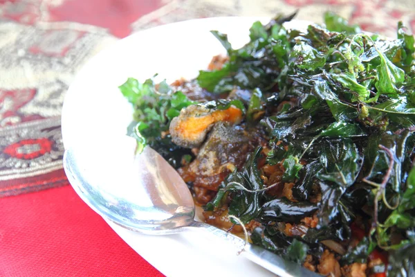 Preserved egg and crispy basil — Stock Photo, Image