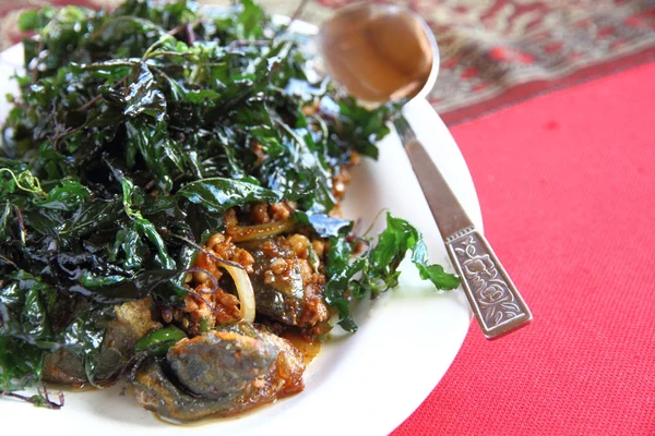 Preserved egg and crispy basil — Stock Photo, Image