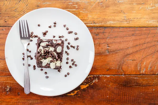 Brownies na dřevěný stůl — Stock fotografie