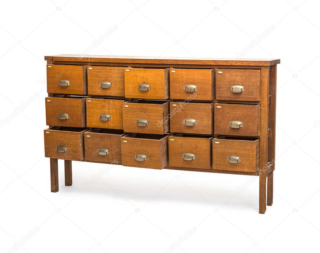 ancient wooden chest with opend drawers isolated