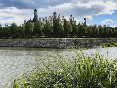 Chateau de Chambord in the Loire Valley, UNESCO world heritage in France, view over the beautiful french garden clipart