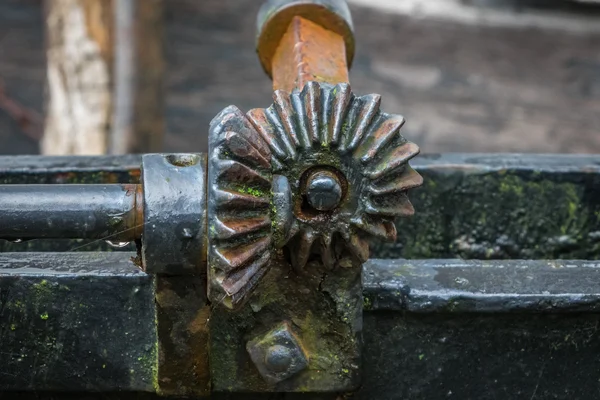 The pinion gear with wheel of an old mechanical  device — Stock Photo, Image