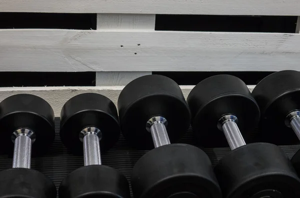 The dumbbells  in a fitness center — Stock Photo, Image