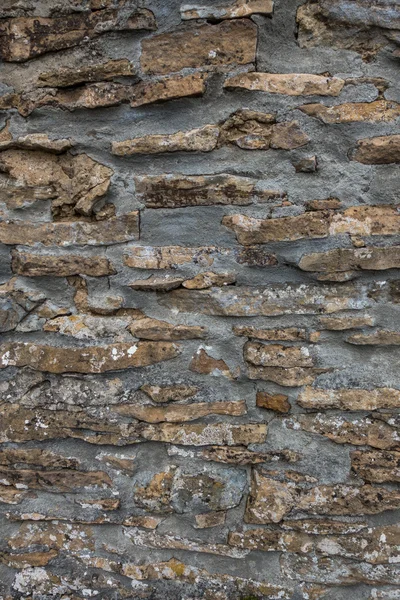 Szary und stary kamienny mur — Zdjęcie stockowe
