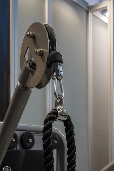 Handle of weight machine with carbine in fitness center — Stock Photo, Image
