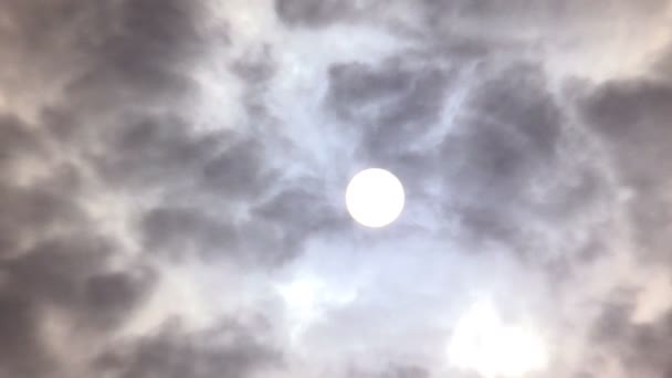 Clouds and dark smoke drifting past sun — Stock Video