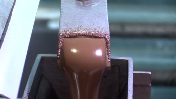 Pouring chocolate in chocolate factory — Stock Video