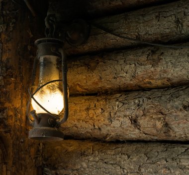 Oil lamp in the old mine clipart