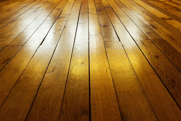 Old painted wooden floor in backlight — Stock Photo, Image