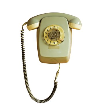 Beyaz arka plan üzerinde kablo ile eski telefon