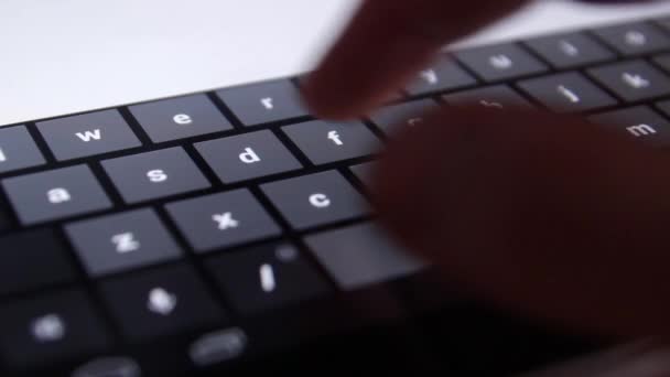 Typing on a tablet — Stock Video