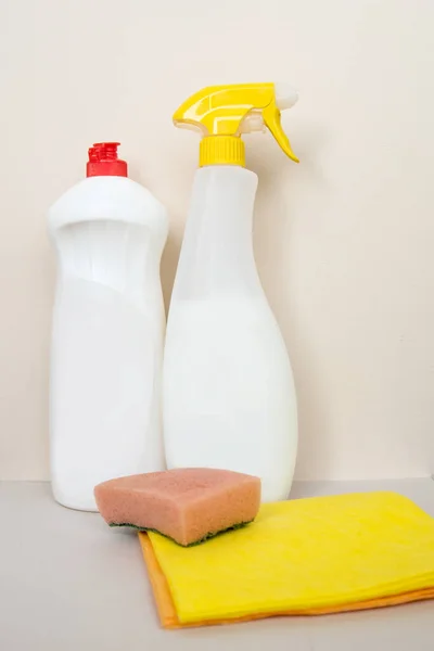 Cleaning set, cleaning cloths with rags and a washcloth on a light background — Stock Photo, Image