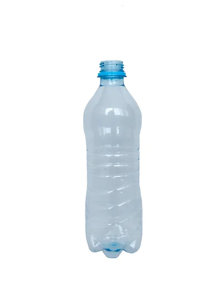 Botella de plástico transparente vacía, sobre un fondo claro —  Fotos de Stock