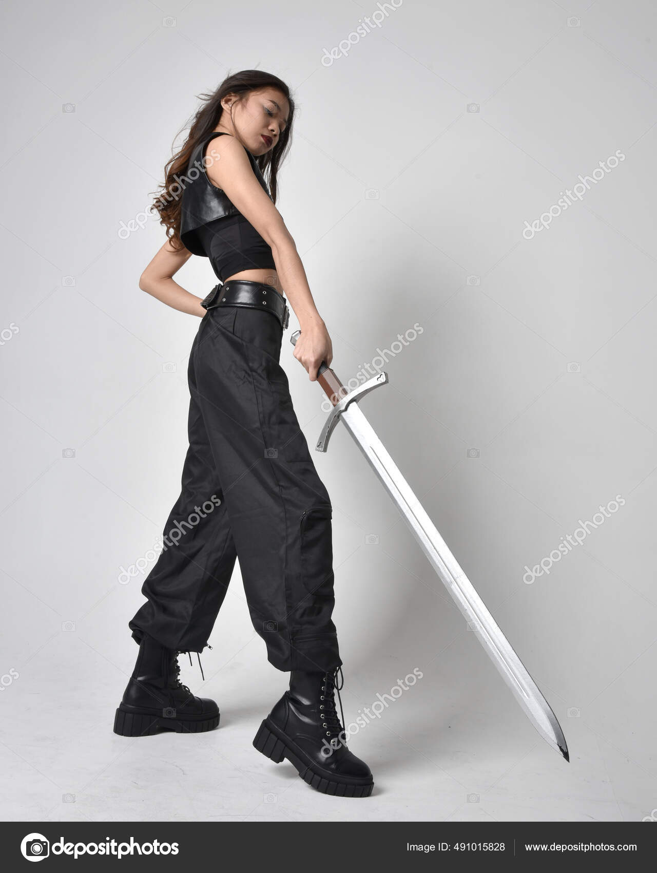 Woman posing with sword stock image. Image of martial - 41302725