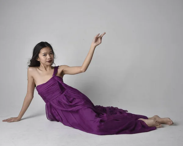 Full Length Portrait Pretty Brunette Asian Girl Wearing Purple Flowing — Stok fotoğraf