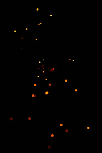 Pomarańczowy Bokeh Czarnym Tle Płonące Niewyraźne Iskry Ognia Cząsteczki Płonących — Zdjęcie stockowe