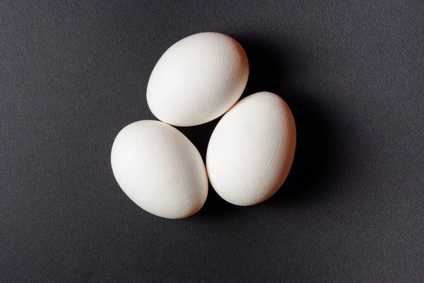 Eggs Black Background Three Eggs Row Shadow Background Eggs Healthy — Stock Photo, Image