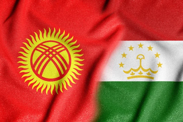 2021年塔吉克斯坦和吉尔吉斯斯坦两国国旗关系恶化期间的概念性照片 — 图库照片