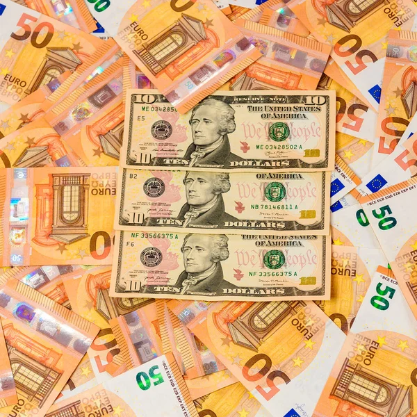 货币的结构从美元和欧元 10美元和50欧元 — 图库照片