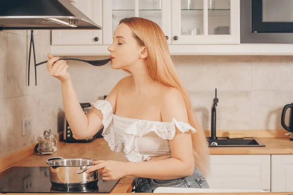 Beautiful Girl Prepares Food Induction Stove Woman Cooks Soup Sauce — Stock Photo, Image
